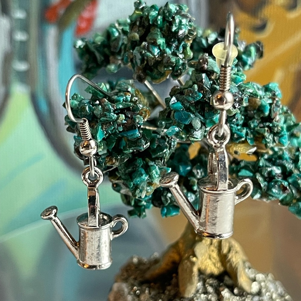 A pair of Vintage Water can silver earrings